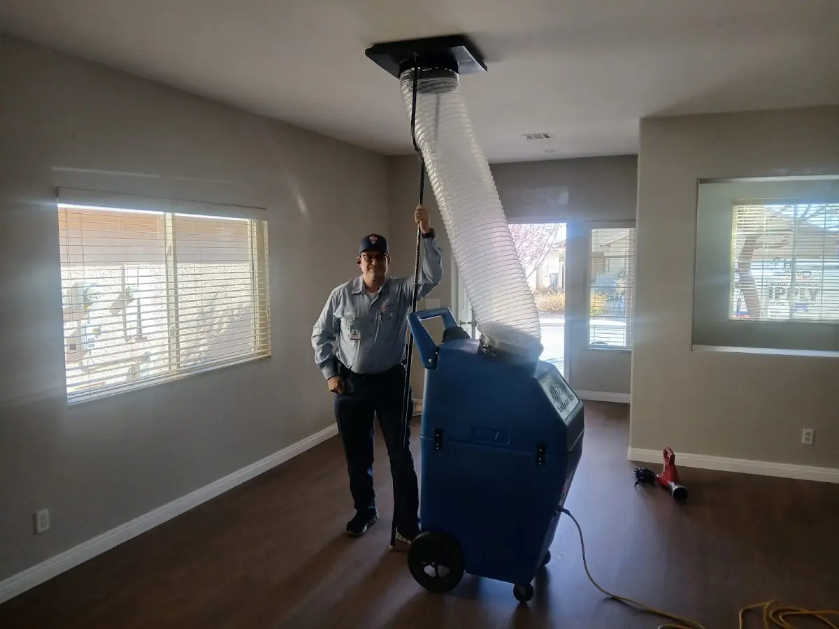 Professional Dryer Vent Cleaning work inside a Perris home